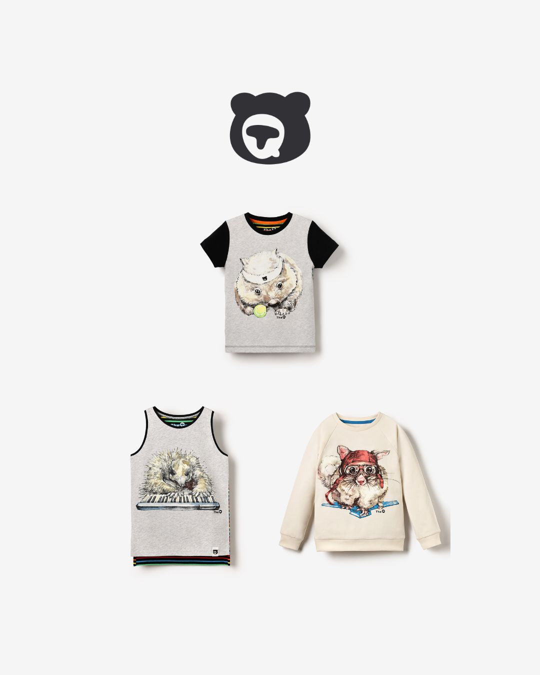 Flat lay of three organic kidswear tops: Echidna Pianist tank top, Wombat Tennis short sleeve tee, and Glider Pilot long sleeve. Unisex summer bundle.