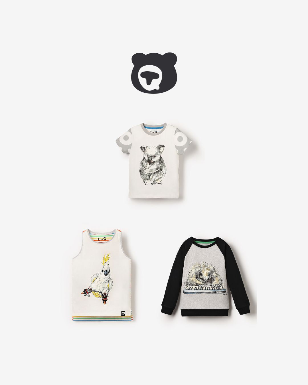 Flat lay of three unisex kids tops: Skating Cockatoo tank top, Koala Cuddle tee, and Echidna Pianist long sleeve. Organic cotton, sustainable bundle.