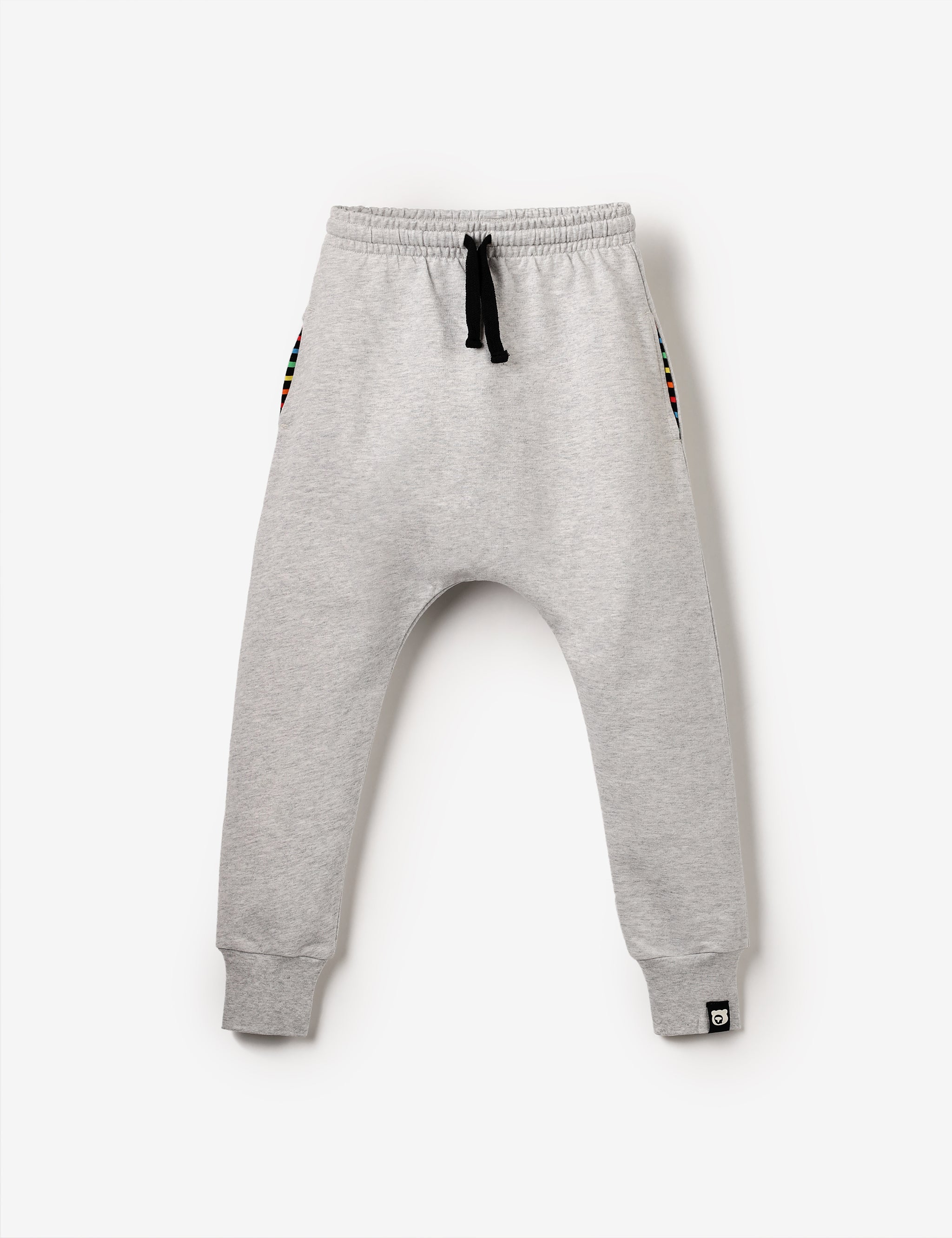 Flat lay of grey marl kids joggers made from soft GOTS-certified organic cotton – sensory-friendly and sustainably made.